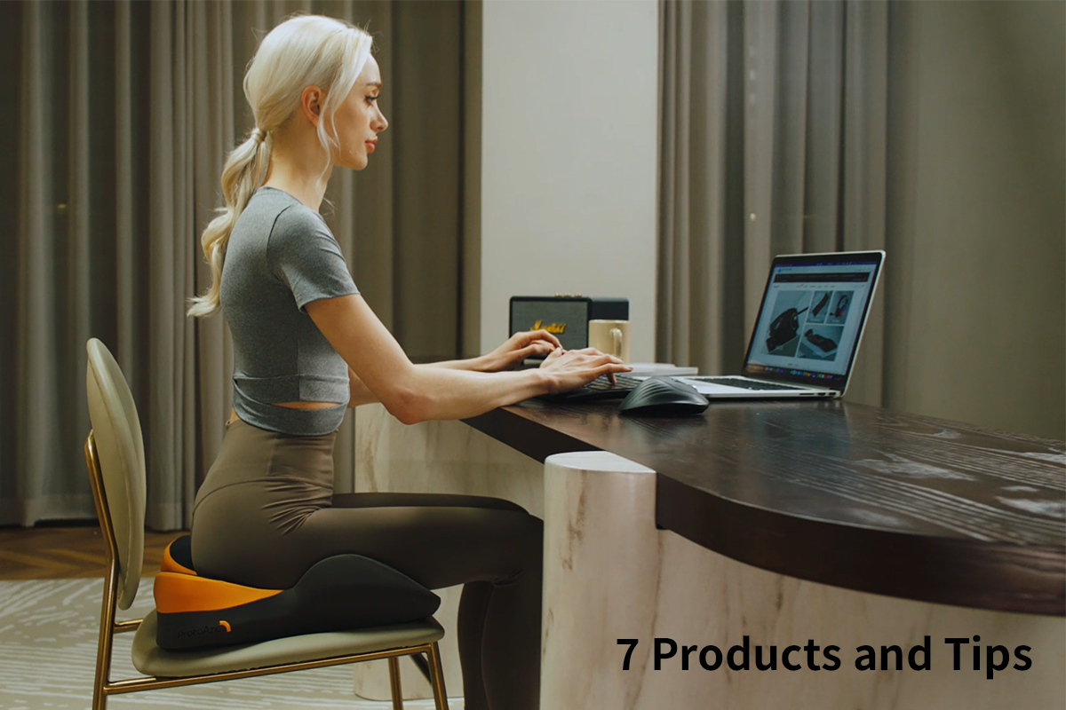 "Side profile of a woman with blonde hair sitting at a wooden desk using a laptop with an ergonomic cushion on her chair, demonstrating proper seated posture with text overlay reading '7 Products and Tips'.