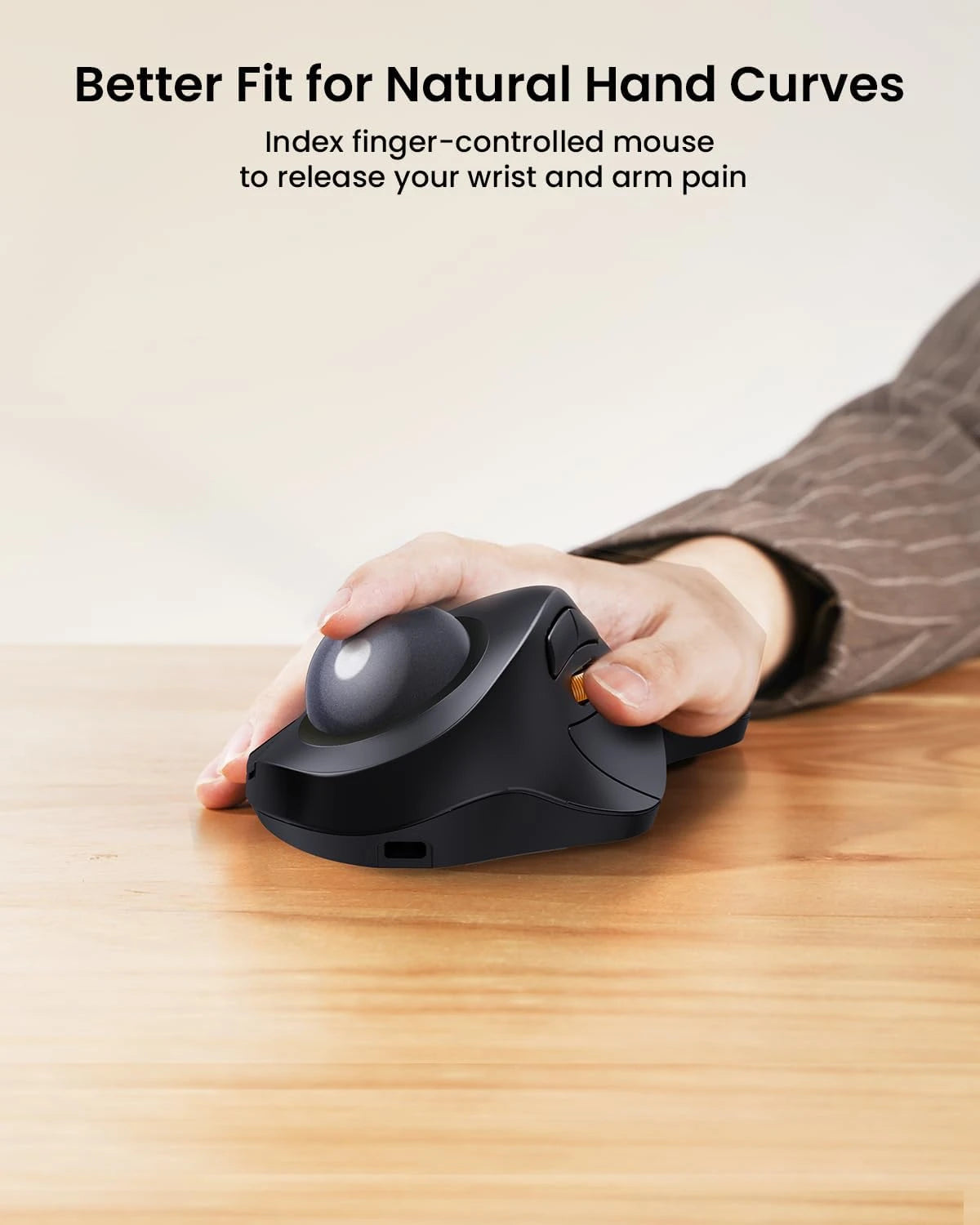 ProtoArc EM03 NL ergonomic trackball mouse with index finger controlling the trackball.