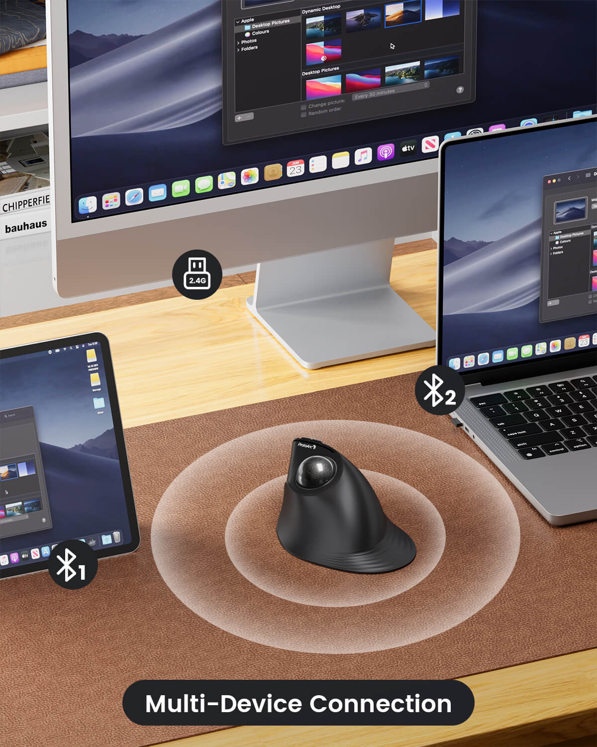 Black ProtoArc EM05 NL trackball mouse connecting to monitor, laptop, and tablet via 2.4G and Bluetooth.