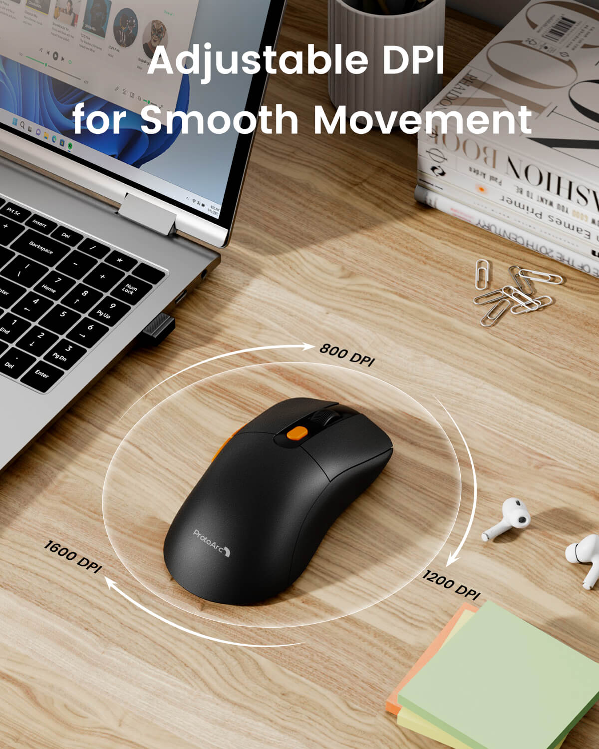 ProtoArc EM15 black wireless mouse with orange scroll wheel, showing 800, 1200, and 1600 DPI settings near a laptop.