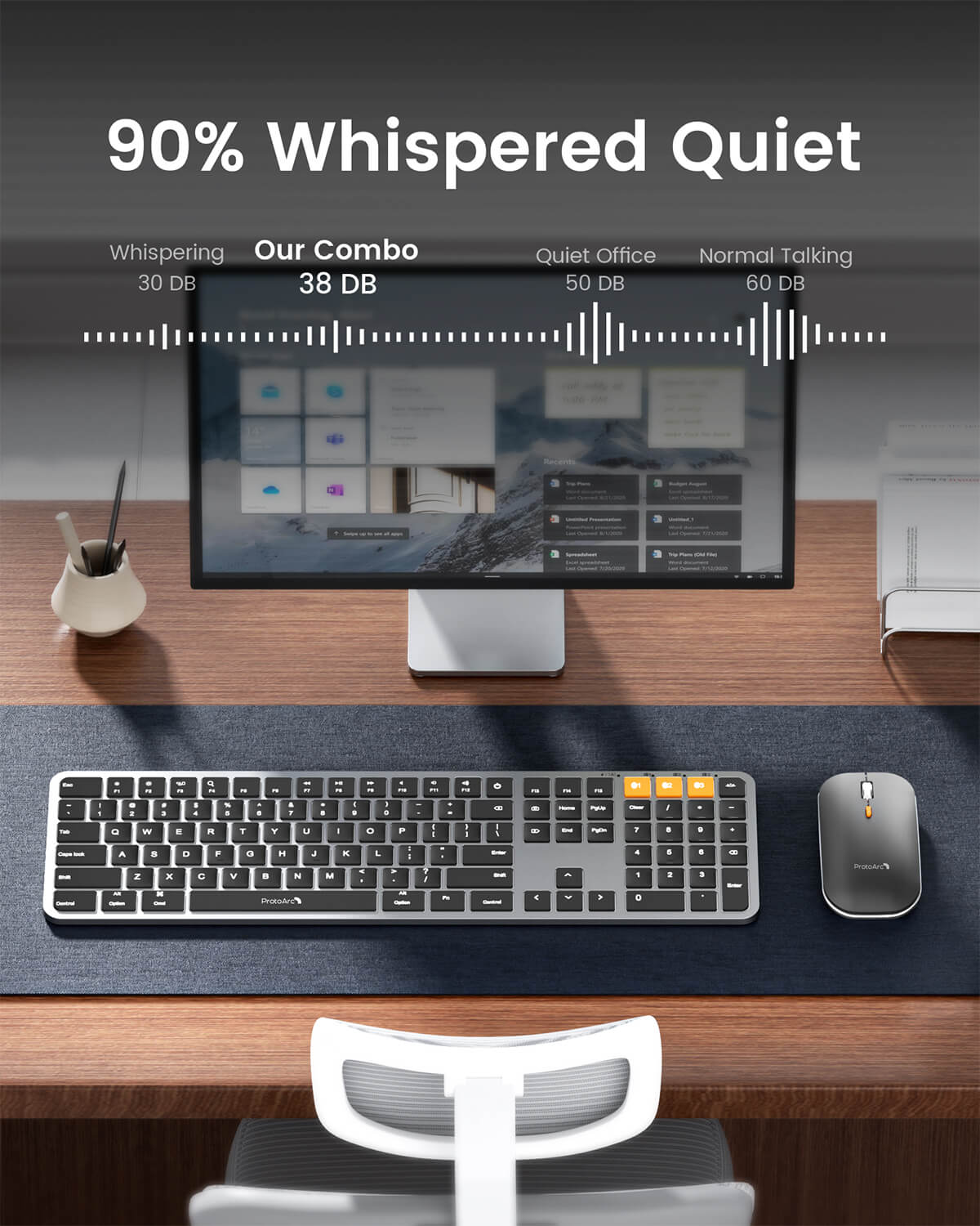 ProtoArc KM100-A backlit Bluetooth keyboard and mouse combo in space gray on a desk, showcasing quiet operation.