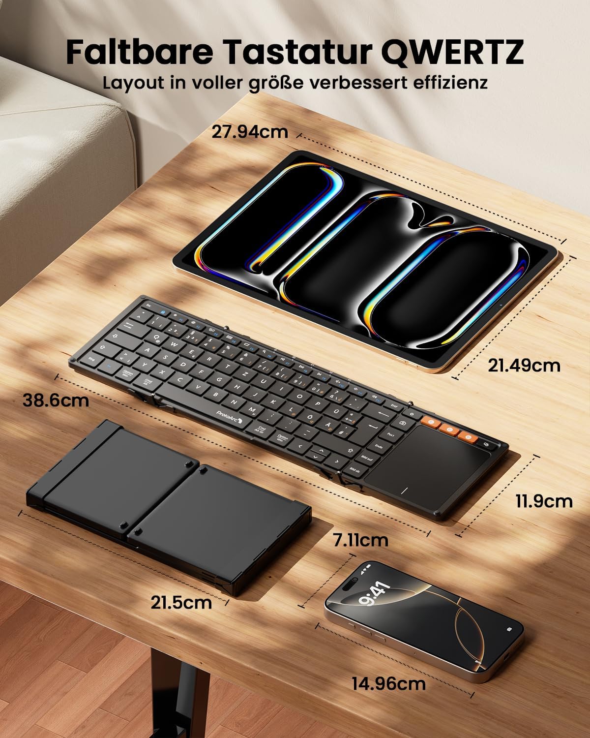 Black foldable QWERTZ Bluetooth keyboard with touchpad open and folded next to a smartphone, showing dimensions.