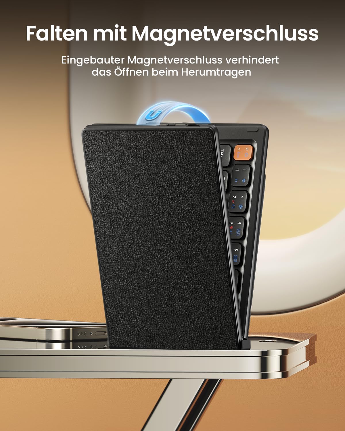 XK04 foldable compact Bluetooth keyboard (DE layout) with magnetic closure, textured black cover.