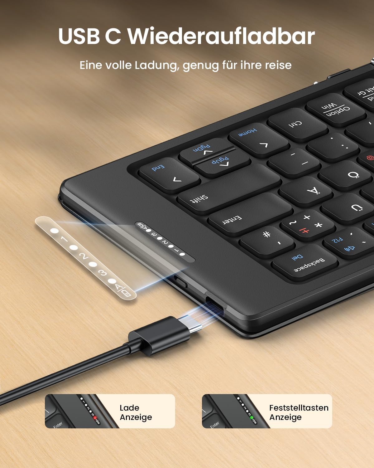 XK04 foldable DE layout keyboard charging via USB-C, showing charge and caps lock indicators.