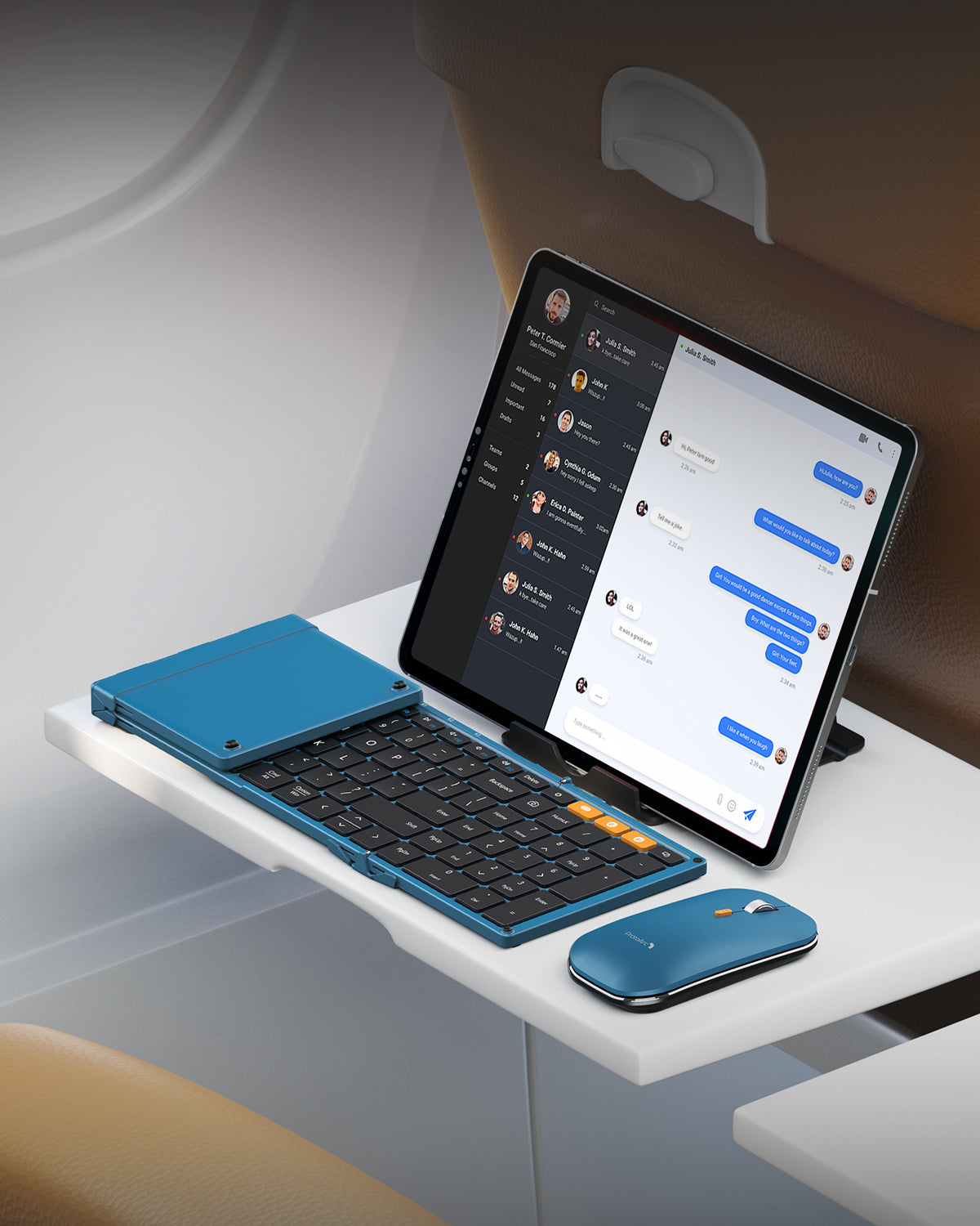 ProtoArc XKM01 foldable keyboard and mouse combo, blue, in use on a plane, ideal for travel and business, multi-device.