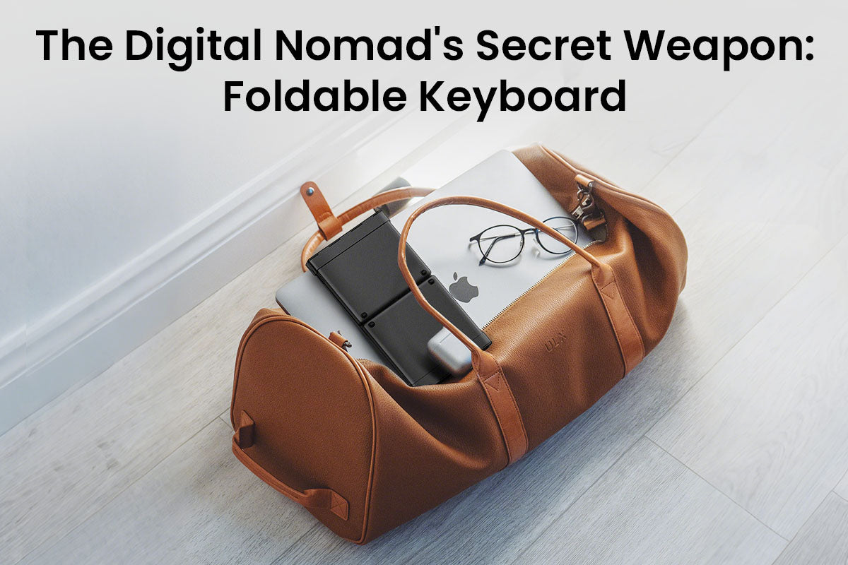 Compact foldable keyboard packed in brown leather travel bag with tablet, phone, and glasses for digital nomad lifestyle
