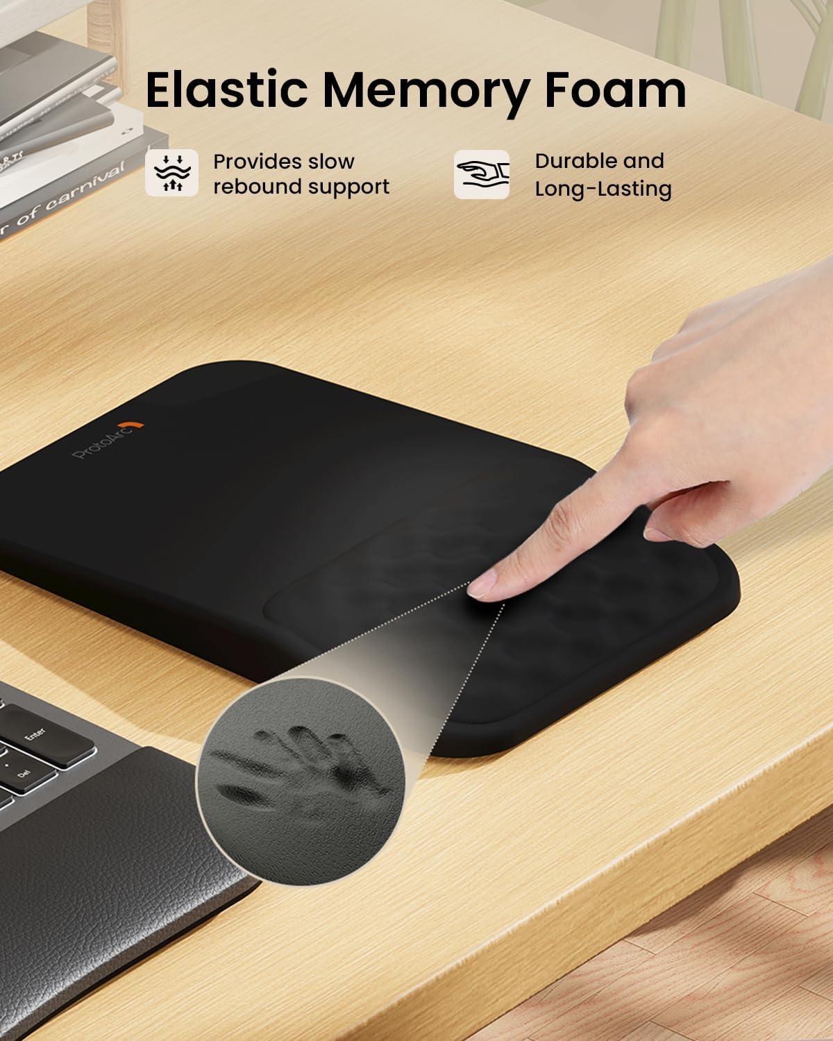 Black ProtoArc elastic memory foam mouse pad with slow rebound wrist support. Shows hand imprint in foam.