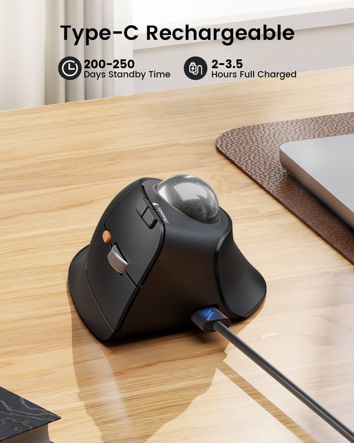 Black EM05 NL ergonomic vertical trackball mouse charging via USB-C, with 200-250 days standby and 2-3.5 hours full charge.