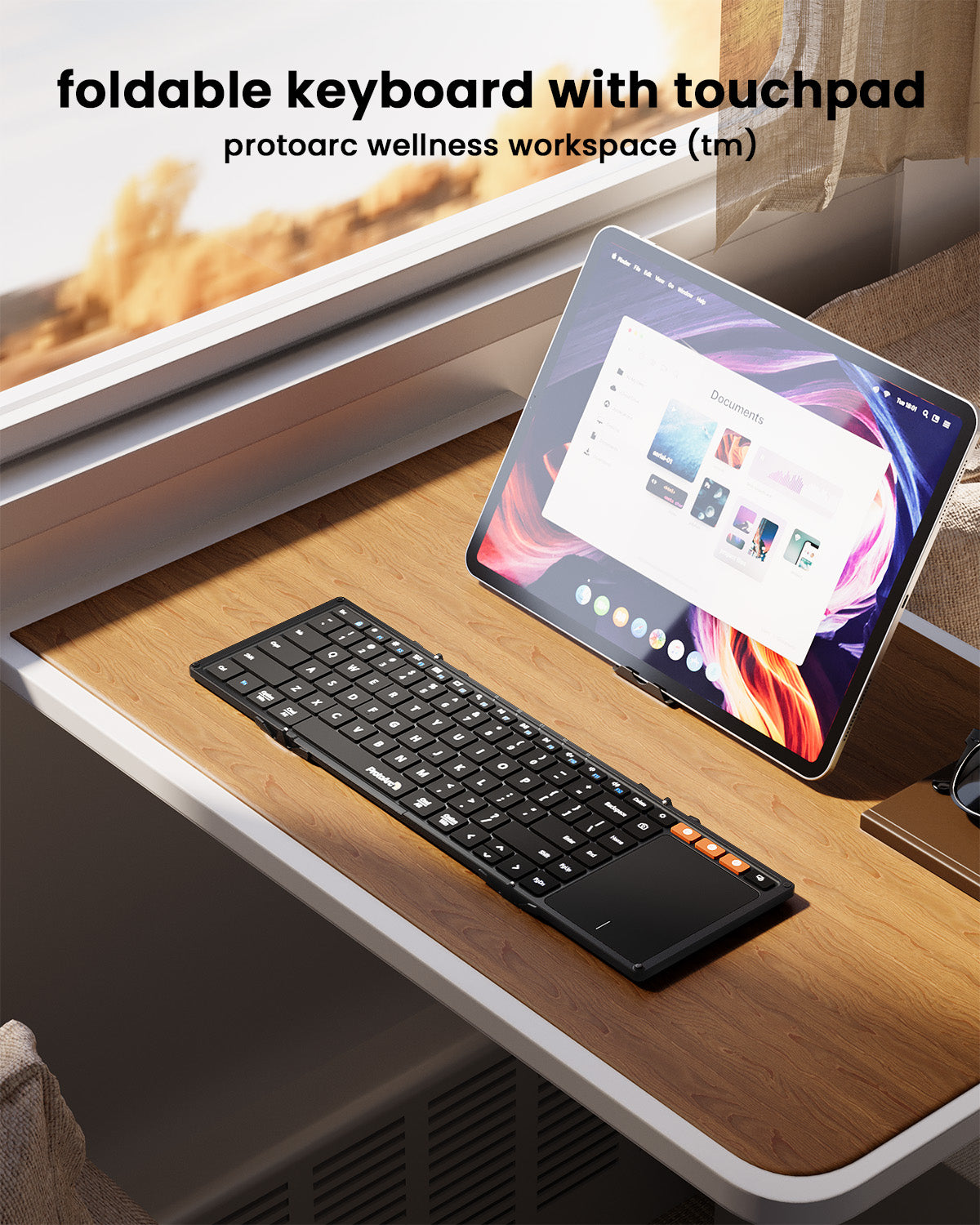 ProtoArc XK01 TP foldable Bluetooth keyboard with integrated touchpad and tablet.