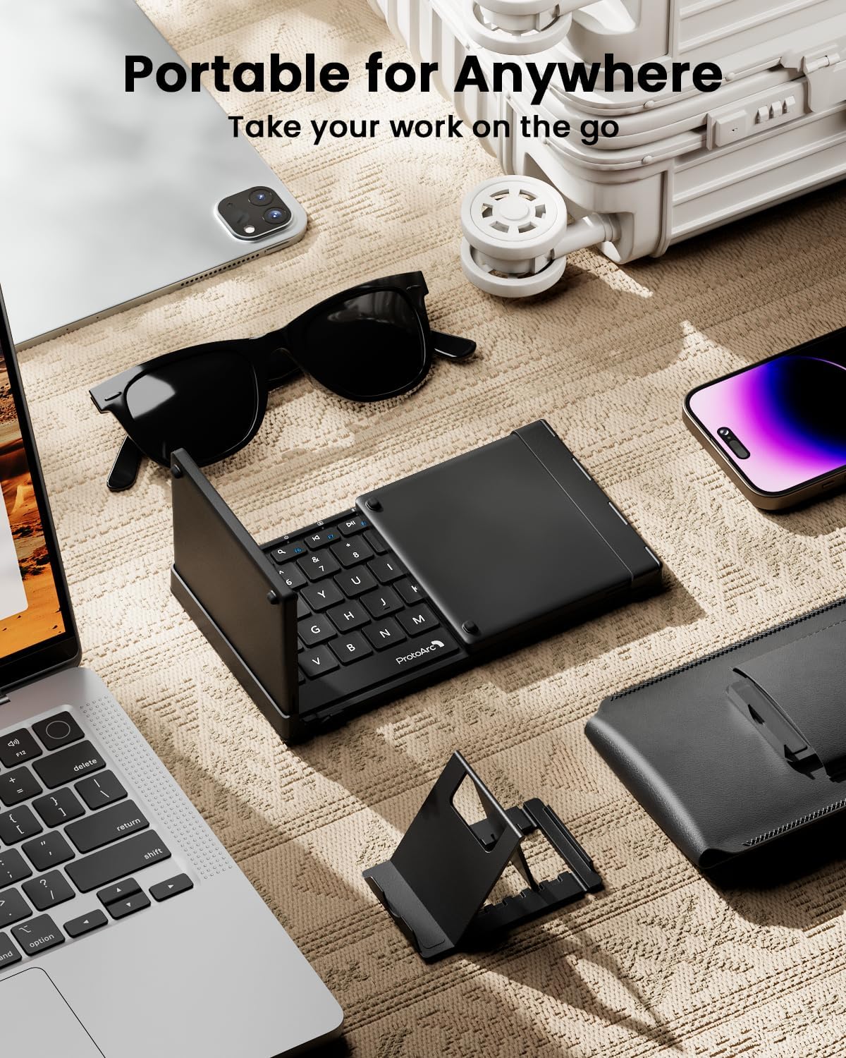 XK01 TP foldable Bluetooth keyboard with UK layout, touchpad, and phone stand, ideal for portable work.