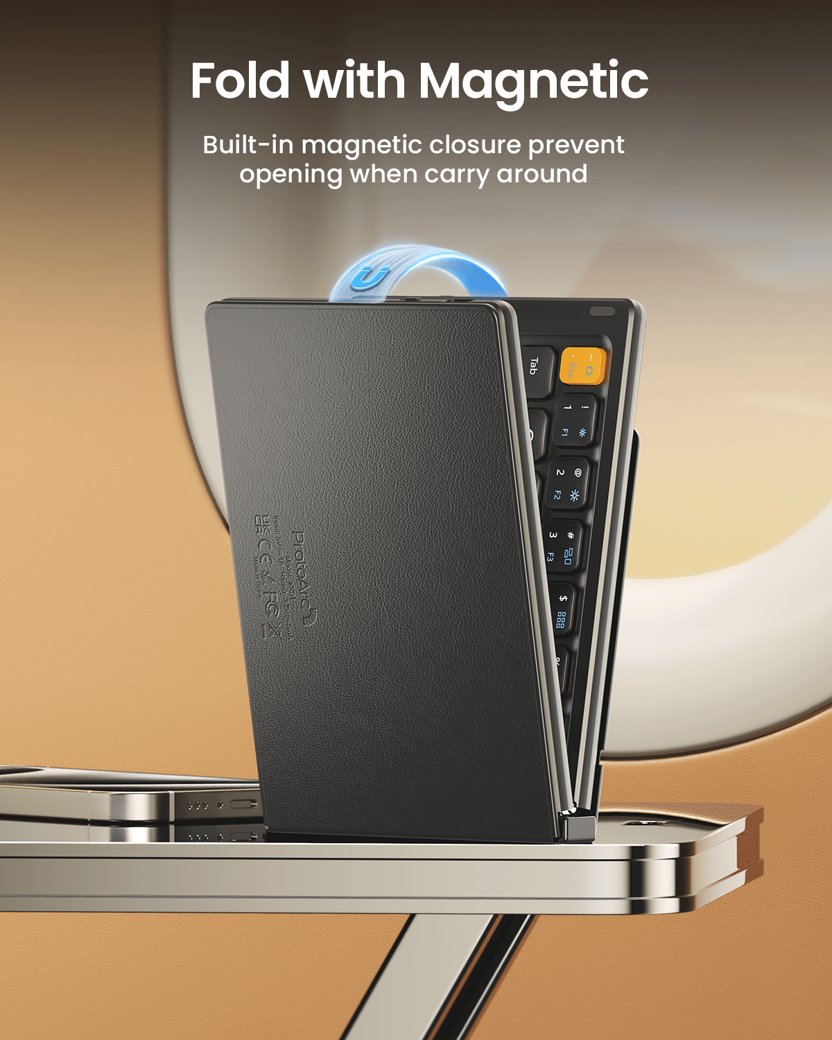 Black foldable compact Bluetooth keyboard with magnetic closure and illuminated keys.