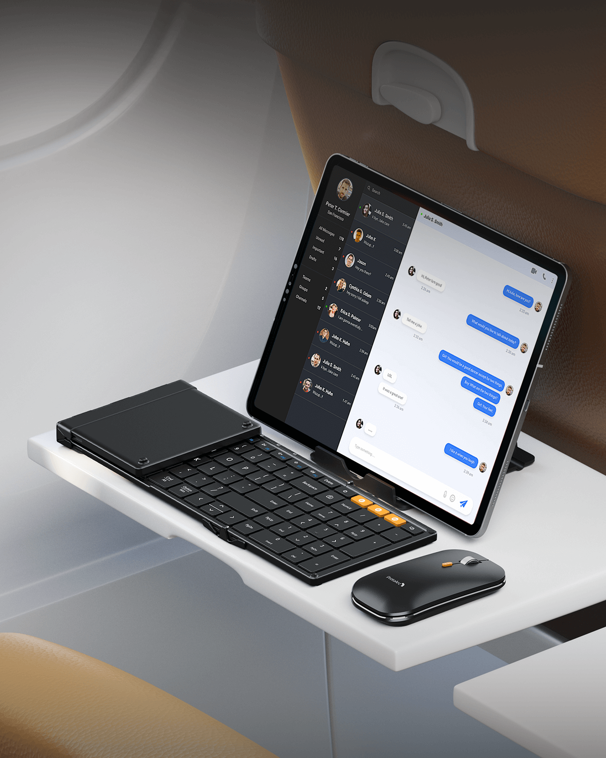 ProtoArc XKM01 foldable keyboard and mouse combo setup with tablet, ideal for travel work and remote communication.