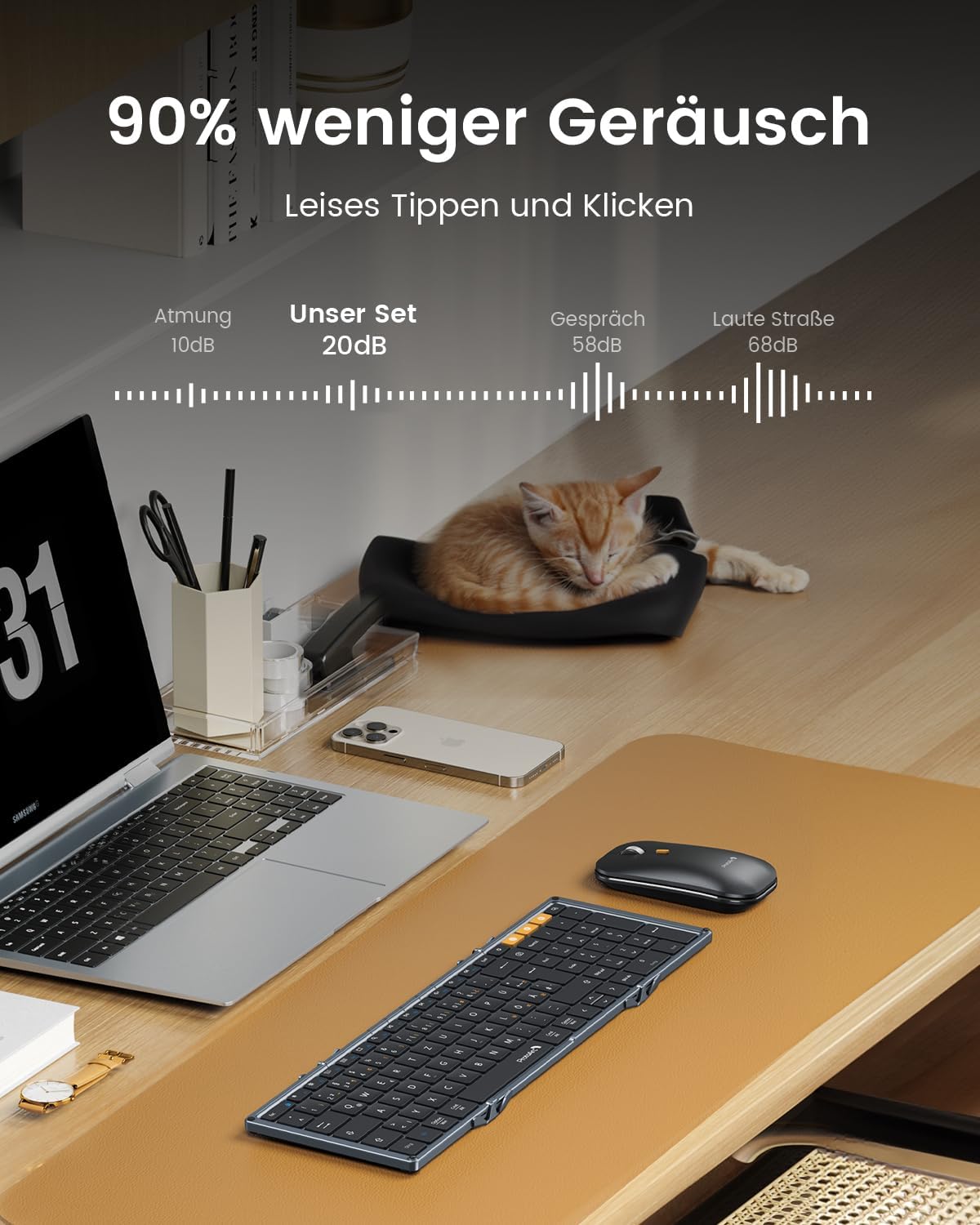XKM01 Tri-Fold Keyboard and Mouse combo on desk, showcasing quiet operation with decibel comparisons of 90% less noise.